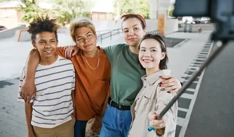 Group of friends smiling for a selfie